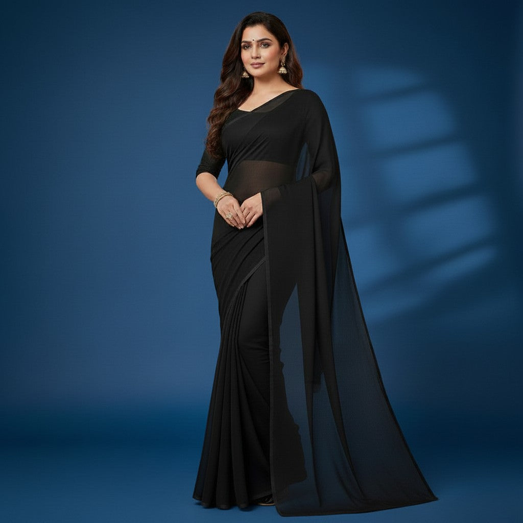 Shafusion black georgette plain saree worn by a model, featuring elegant drape and matching blouse for festive wear.