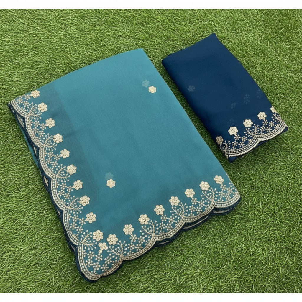 Shafusion blue star georgette saree with intricate floral embroidery and matching unstitched blouse piece