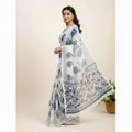 Shafusion blue and white floral printed georgette saree worn by a model with an unstitched blouse piece