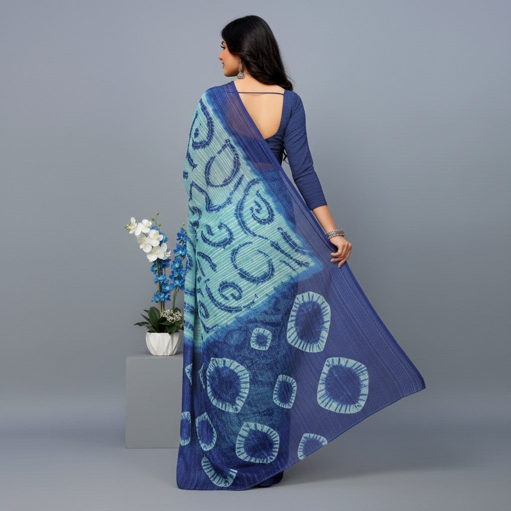 Shafusion blue georgette saree with abstract circular print and matching unstitched blouse worn by a woman