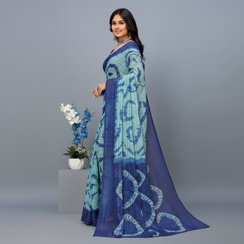 Shafusion blue georgette saree with printed circular patterns and unstitched blouse worn by a model