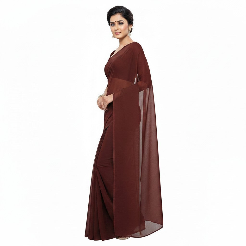 Shafusion coffee brown plain georgette saree worn by a woman, suitable for casual and festive occasions.