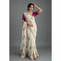 Shafusion cream star georgette saree featuring intricate embroidery and a contrasting magenta unstitched blouse