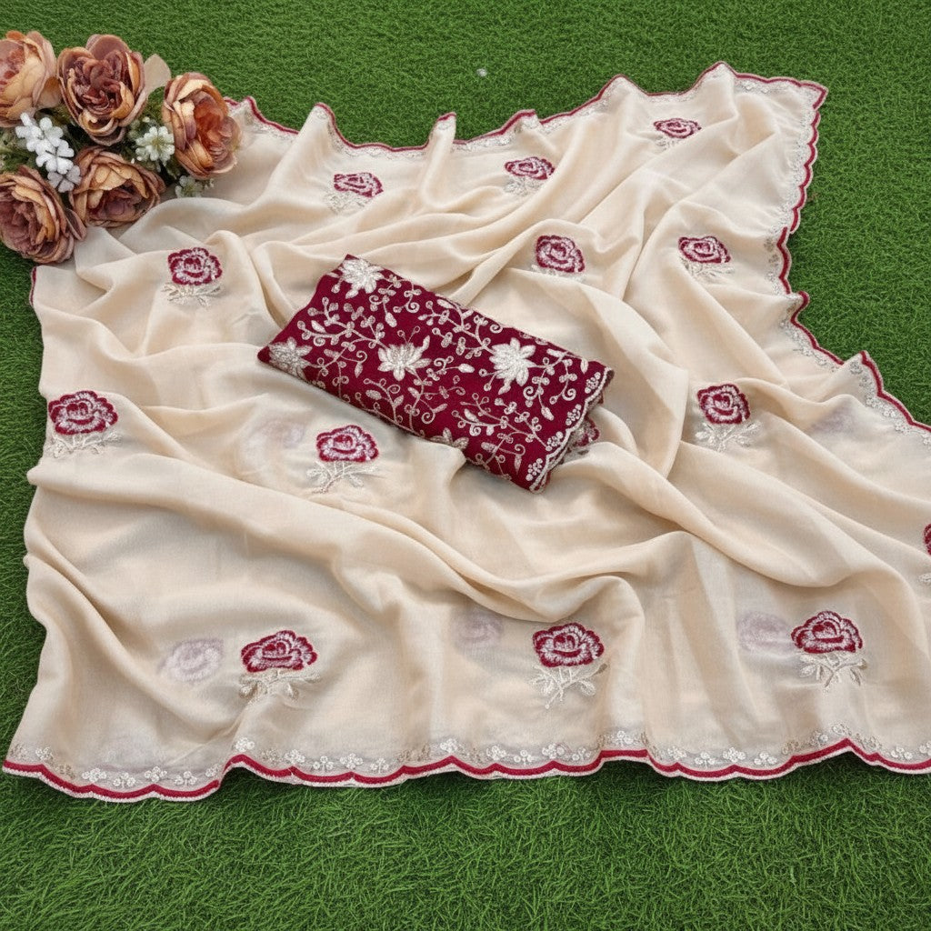 Shafusion cream star georgette saree featuring maroon floral embroidery and a matching unstitched blouse piece