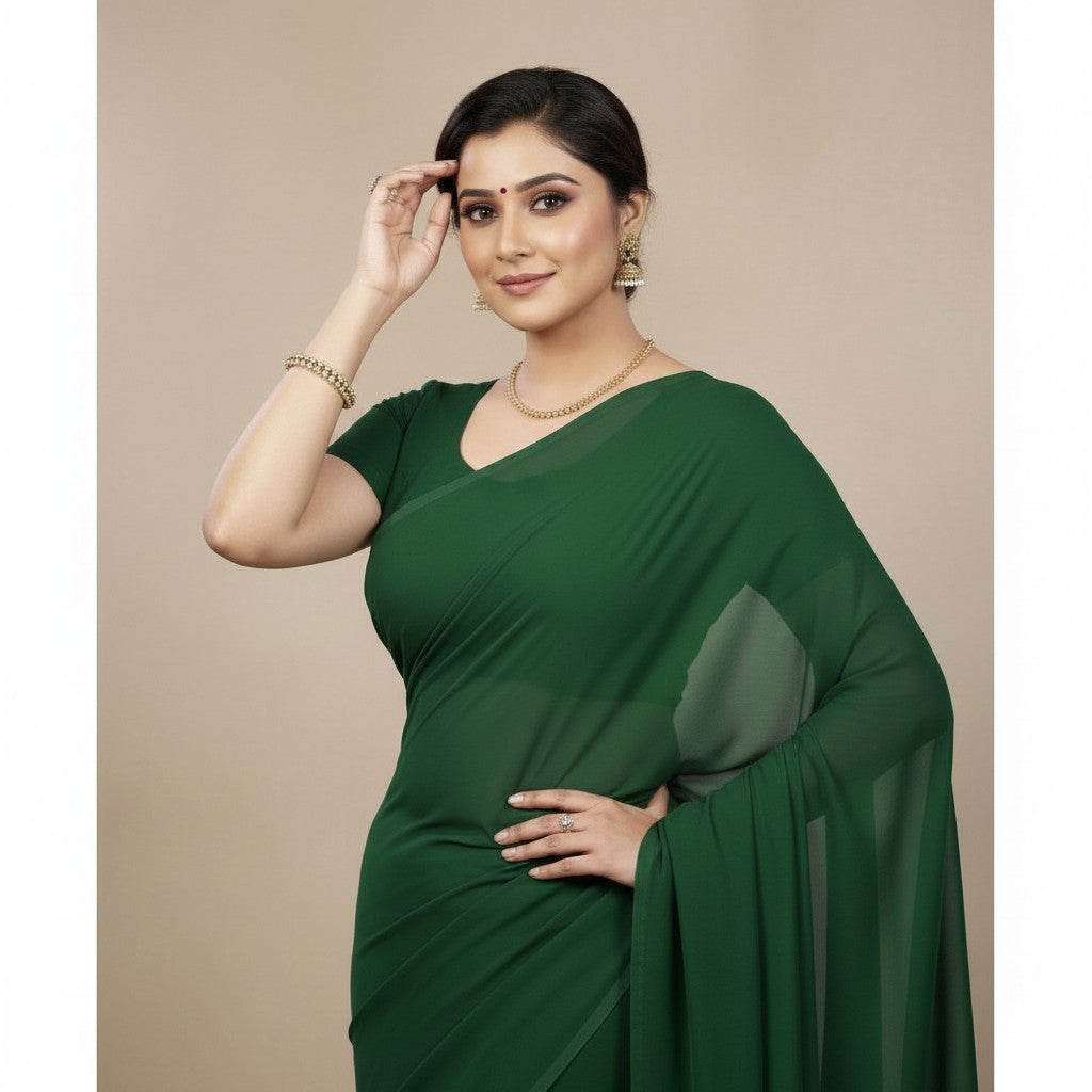 Shafusion dark green plain georgette saree worn by a woman with traditional jewelry against a neutral background