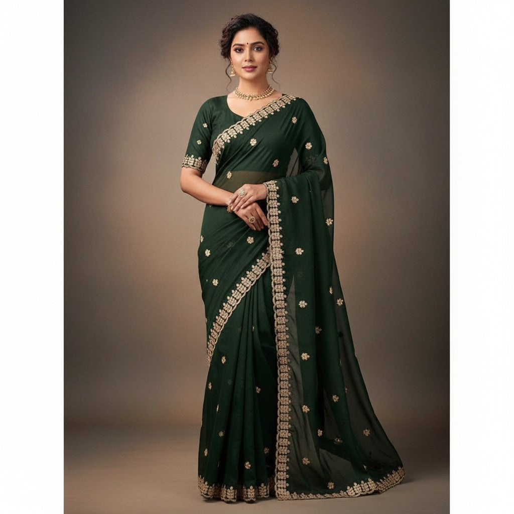 Shafusion green georgette saree featuring intricate gold embroidery and an unstitched blouse worn by a model.