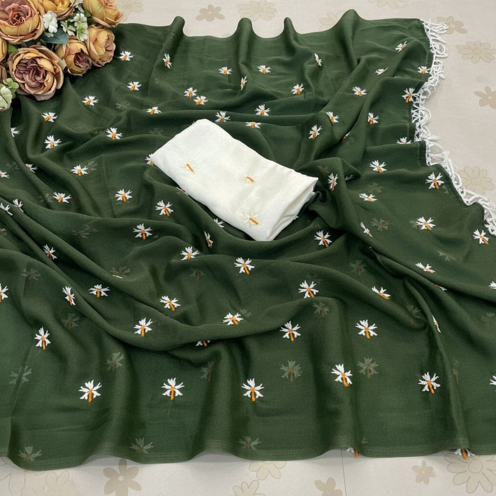 Shafusion green georgette saree featuring white floral embroidery and a matching unstitched blouse piece