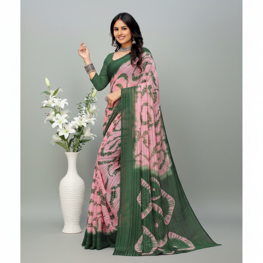 Shafusion green and pink printed georgette saree with unstitched blouse worn by a model next to a white flower vase