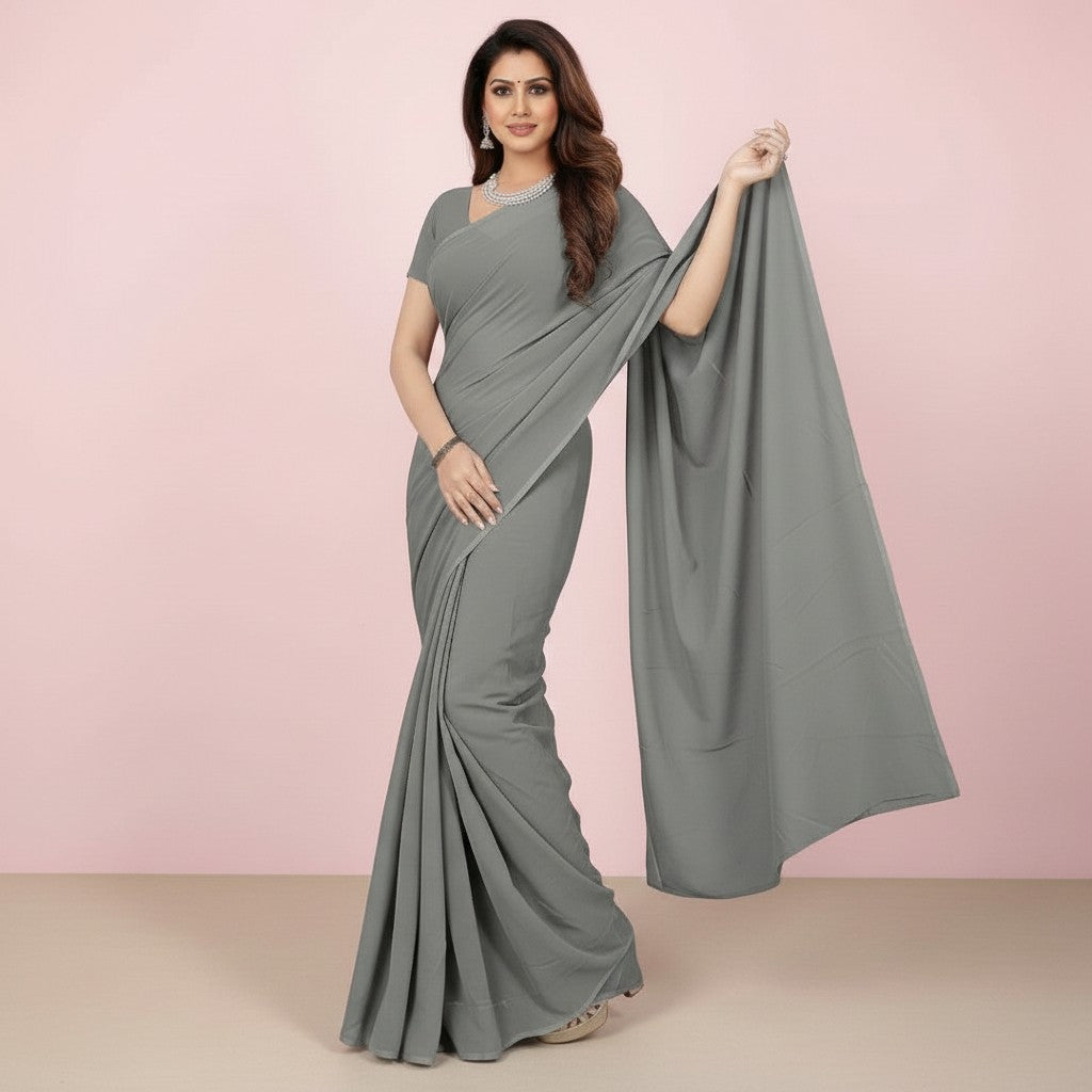 Shafusion grey georgette plain saree worn by a model with matching blouse, suitable for casual and festive wear.