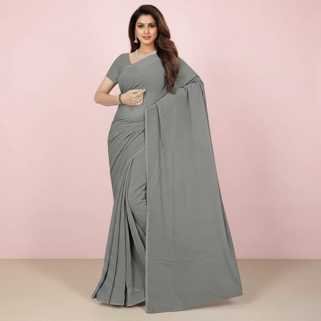 Shafusion grey georgette plain saree with matching blouse worn by a model against a soft pink background