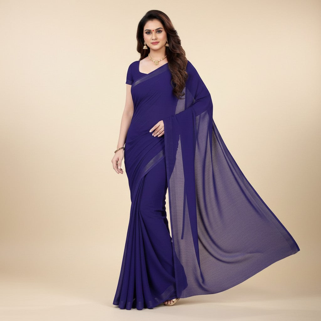 Shafusion navy blue georgette plain saree worn by a model with a matching blouse for casual and festive occasions.