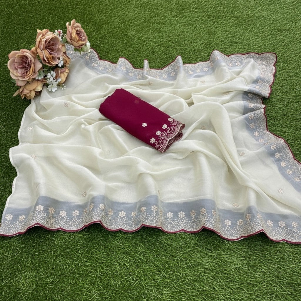 Shafusion off white star georgette saree with embroidered scalloped border and a folded deep maroon unstitched blouse