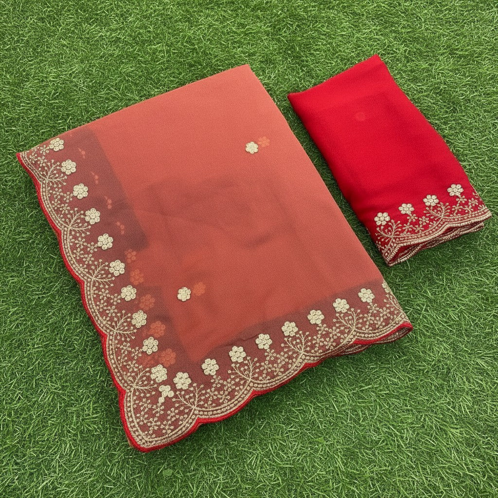 Shafusion orange star georgette saree with intricate floral embroidery and matching unstitched blouse piece