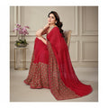Shafusion red georgette saree with intricate printed border and unstitched blouse worn by a woman in a studio setting