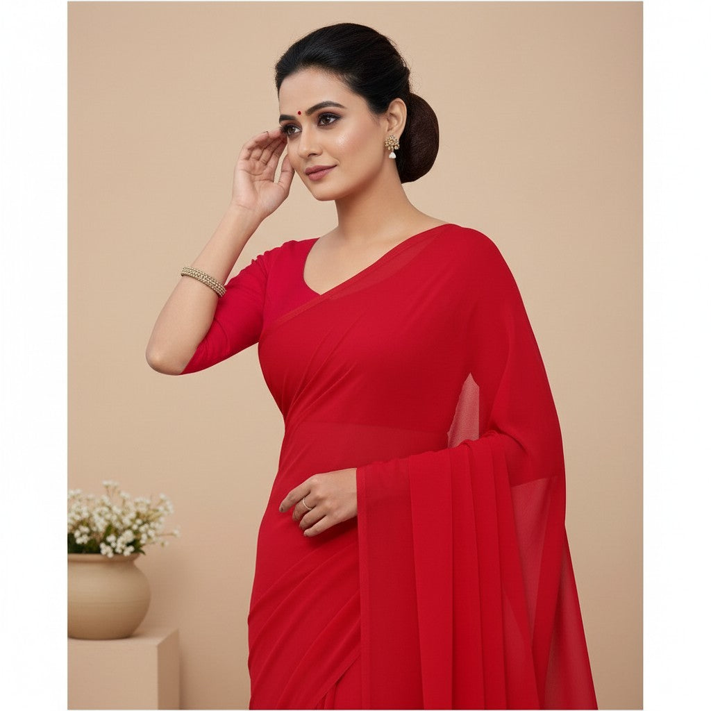Shafusion red georgette plain saree with matching blouse worn by a woman in a studio setting