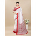 Shafusion white and red printed georgette saree with matching unstitched blouse worn by a model