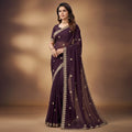 Shafusion wine georgette saree featuring intricate embroidery and an unstitched blouse worn by a model